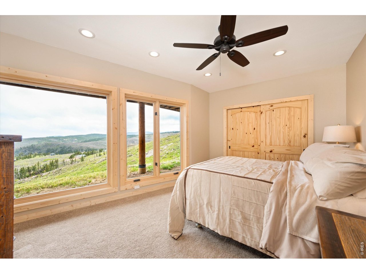 4119 Davis Ranch Road Bellvue, CO 80512 - Photo 36 of 47 Second bedroom with full wall of views to wake up to