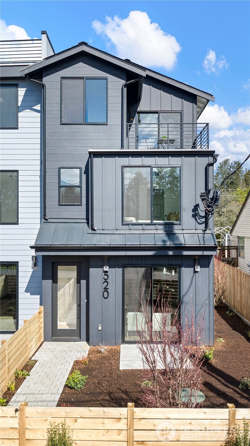 520 North 102nd Street Seattle, WA 98133 - Photo 1 of 20 a view of a house with backyard and deck