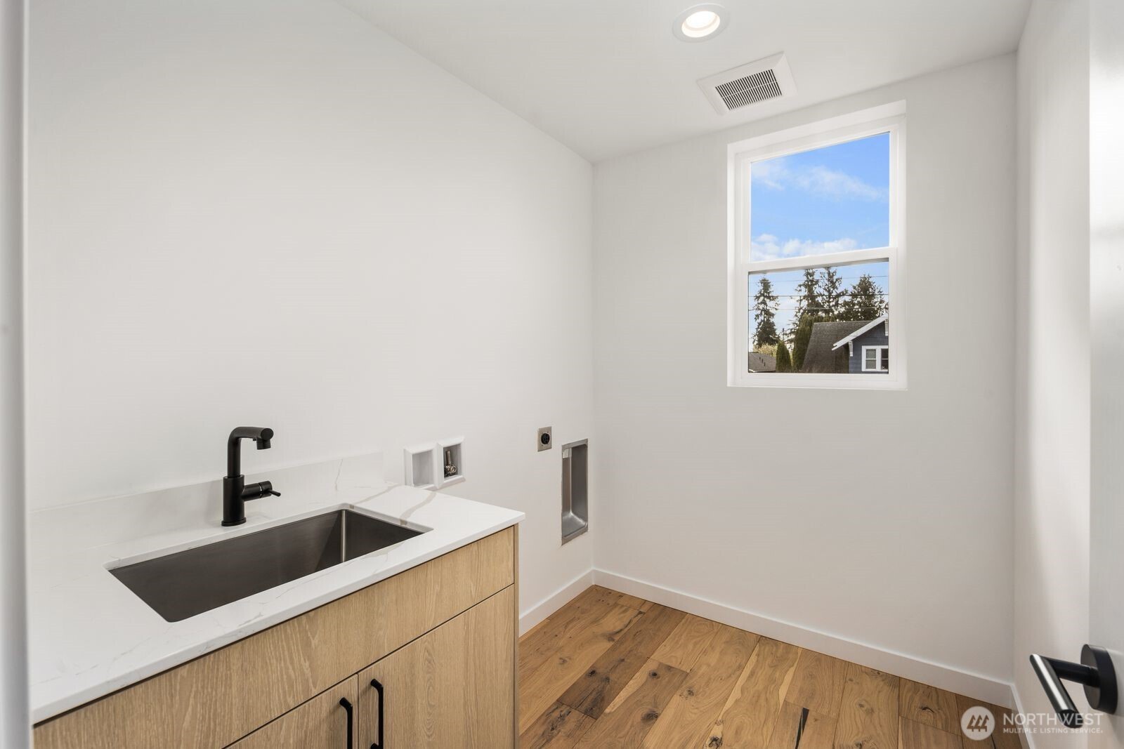 520 North 102nd Street Seattle, WA 98133 - Photo 20 of 20 a view of a bathroom with a sink and vanity