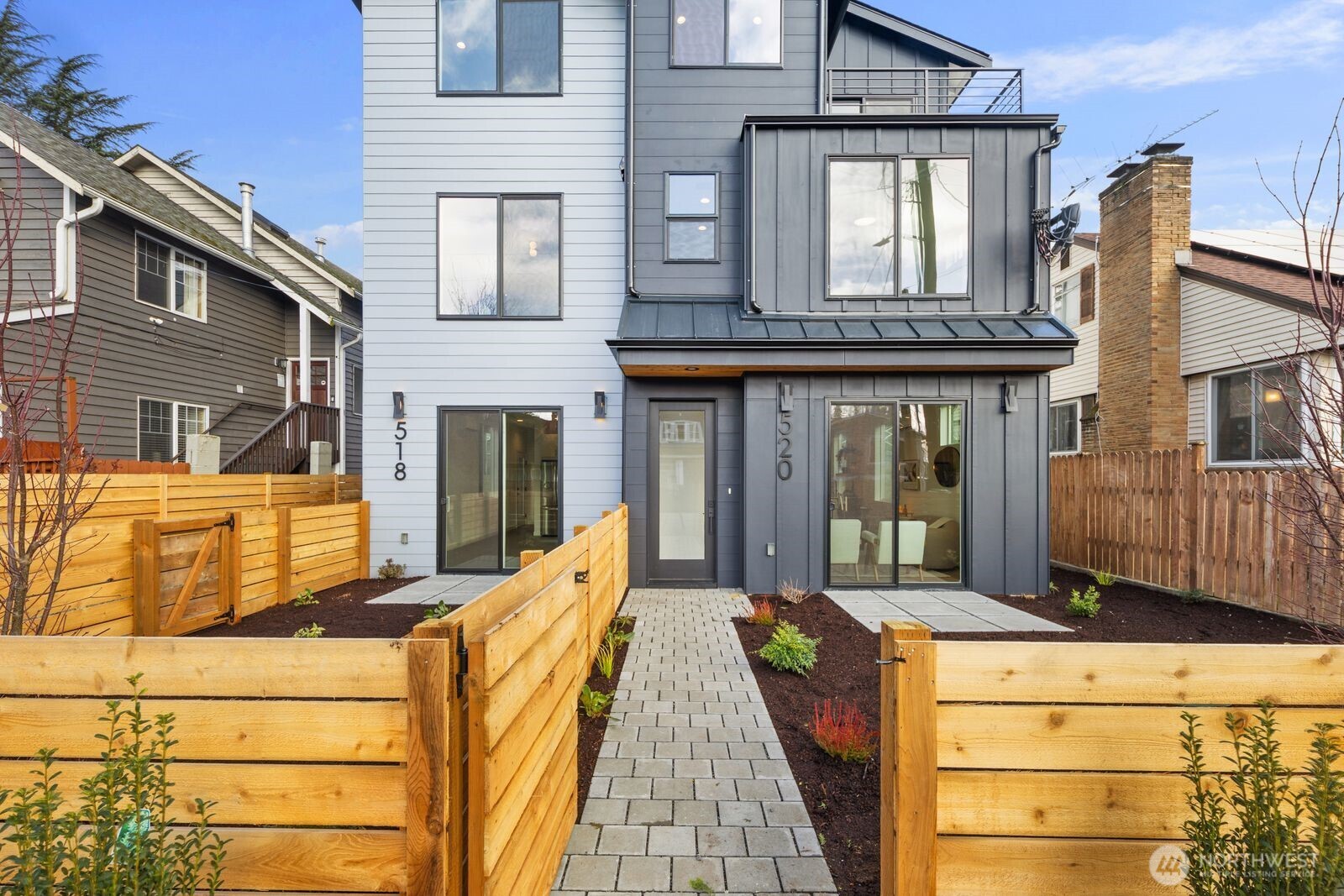 520 North 102nd Street Seattle, WA 98133 - Photo 3 of 20 a view of a brick house with large windows