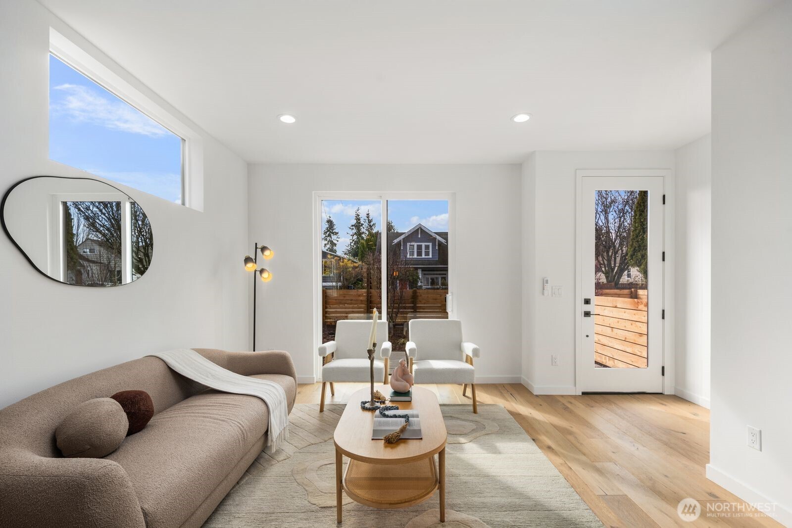 520 North 102nd Street Seattle, WA 98133 - Photo 5 of 20 a living room with furniture and a large window