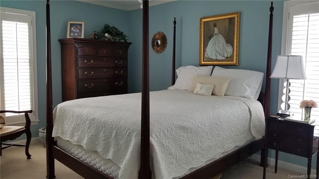 225 Pine Street Fort Mill, SC 29715 - Photo 14 of 40 a bedroom with a bed and a dresser