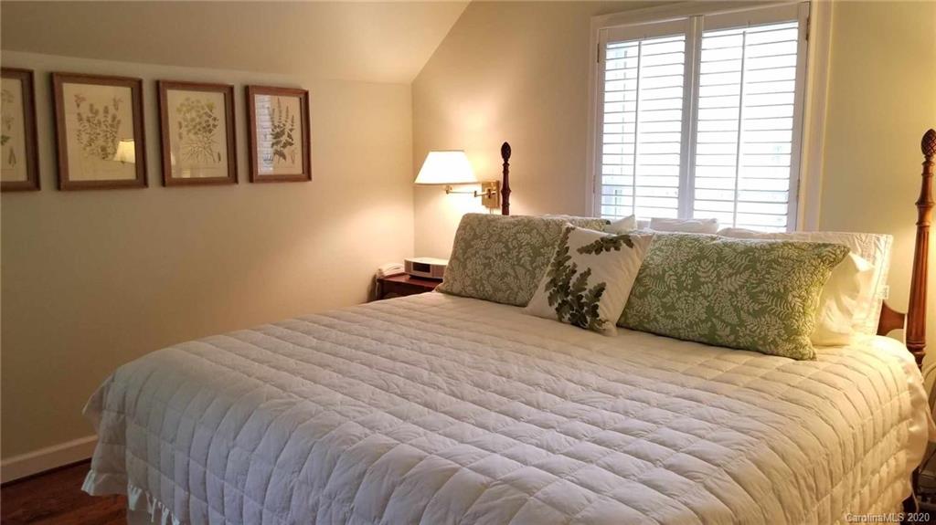225 Pine Street Fort Mill, SC 29715 - Photo 20 of 40 a large bed sitting in a bedroom next to a window