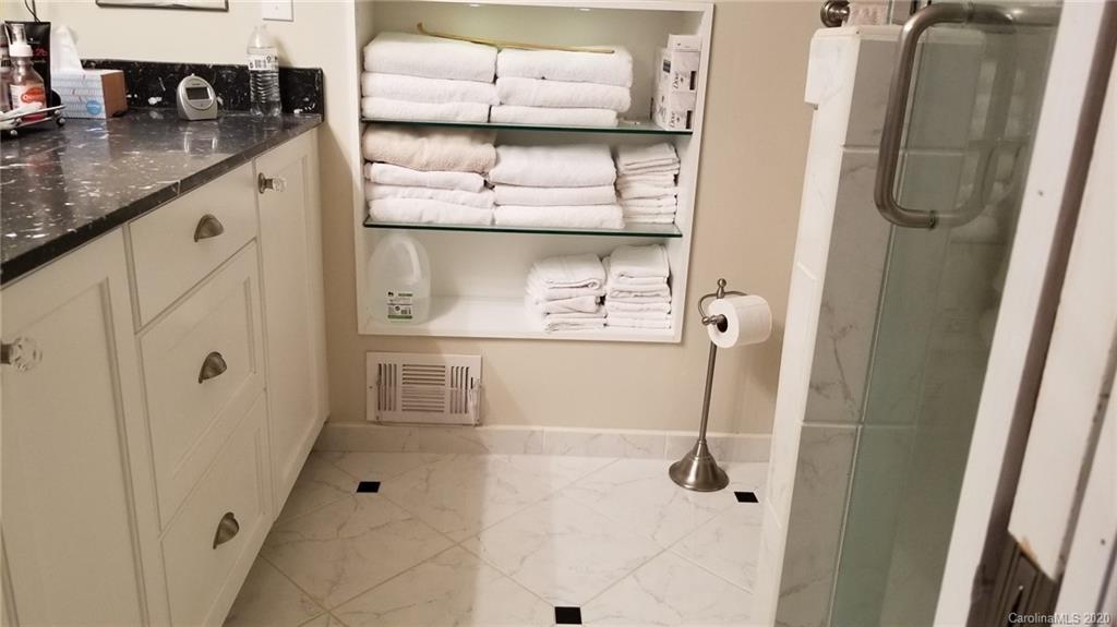 225 Pine Street Fort Mill, SC 29715 - Photo 22 of 40 a bathroom with a granite countertop shower