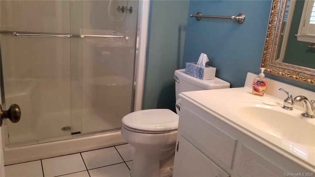 225 Pine Street Fort Mill, SC 29715 - Photo 23 of 40 a bathroom with a sink toilet and shower