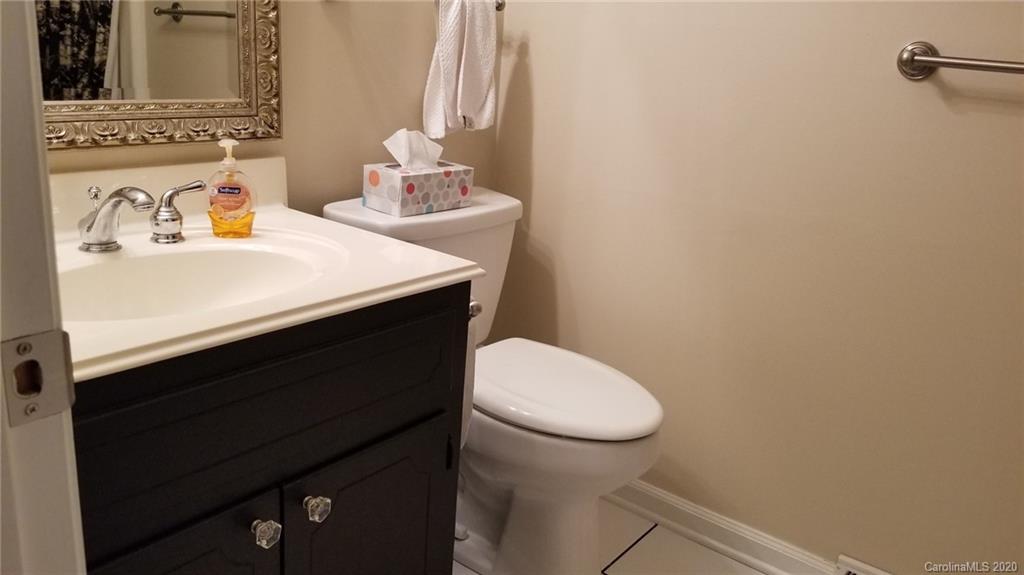 225 Pine Street Fort Mill, SC 29715 - Photo 24 of 40 a bathroom with a sink and a toilet