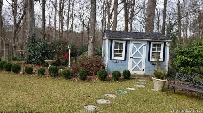 225 Pine Street Fort Mill, SC 29715 - Photo 27 of 40 a front view of a house with garden