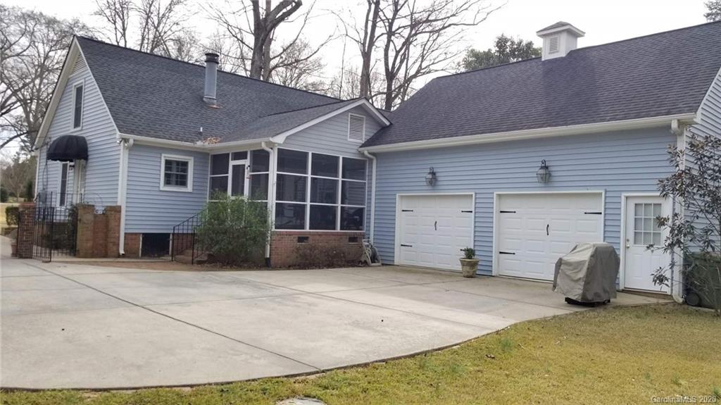 225 Pine Street Fort Mill, SC 29715 - Photo 35 of 40 a view of a house with a yard and garage