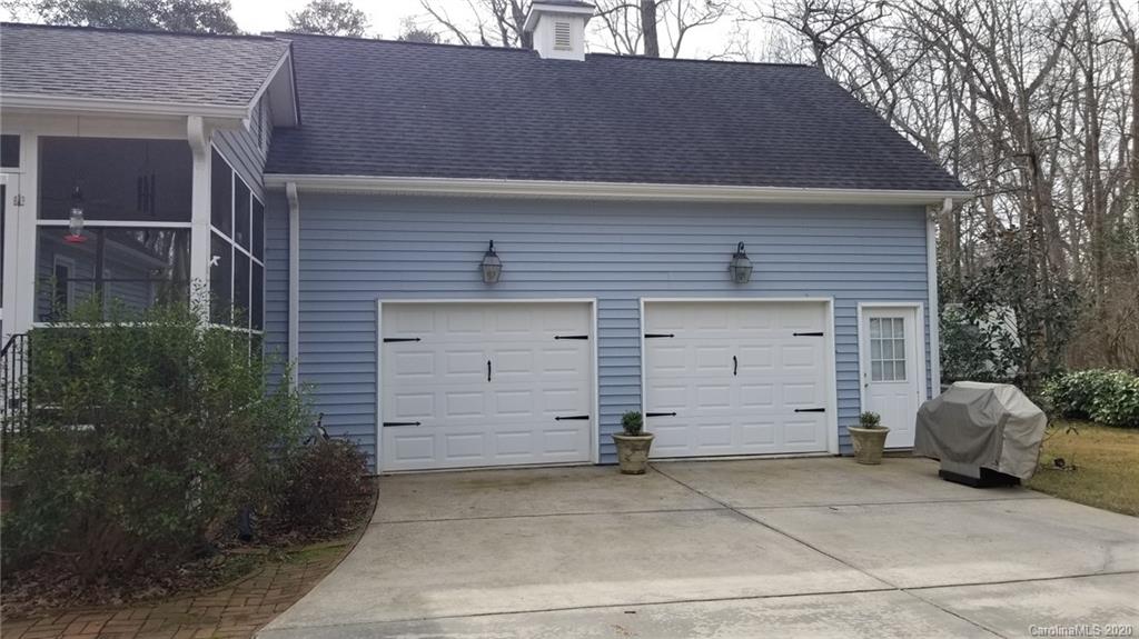 225 Pine Street Fort Mill, SC 29715 - Photo 39 of 40 a front view of a house with a garage