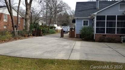 225 Pine Street Fort Mill, SC 29715 - Photo 40 of 40 a view of a patio with table and chairs and potted plants