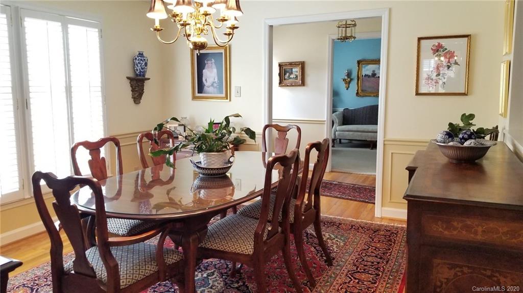 225 Pine Street Fort Mill, SC 29715 - Photo 9 of 40 a view of a dining room with furniture and chandelier