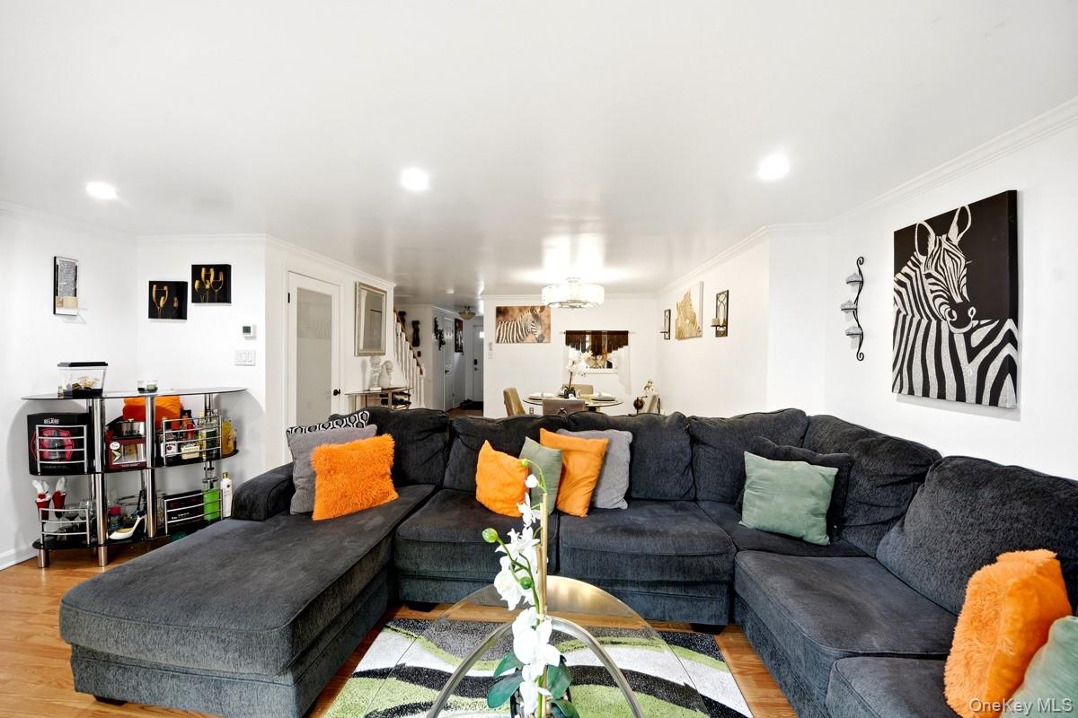 708 Mallard Way Peekskill, NY 10566 - Photo 11 of 29 a living room with furniture and kitchen view