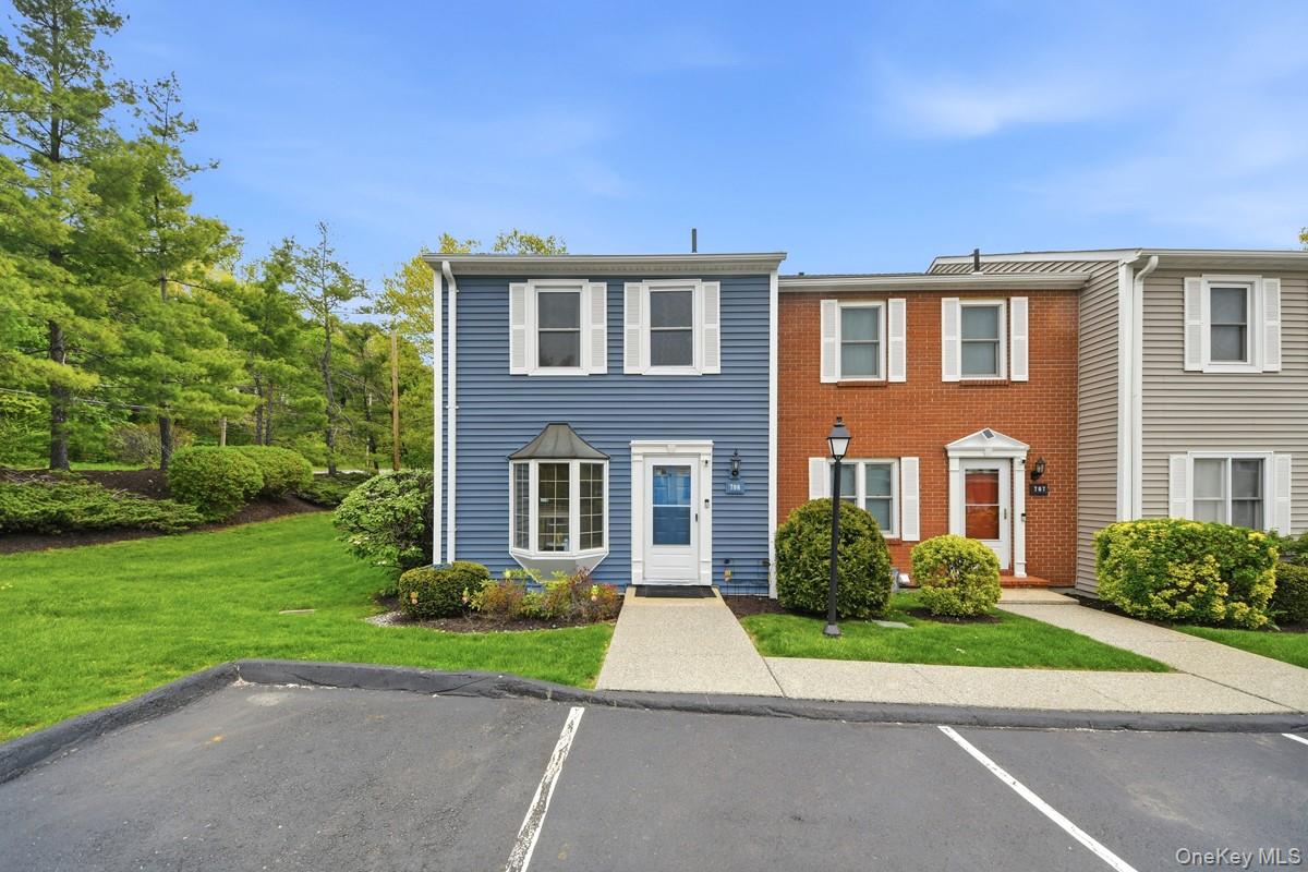 708 Mallard Way Peekskill, NY 10566 - Photo 2 of 29 a front view of a house with a yard and trees