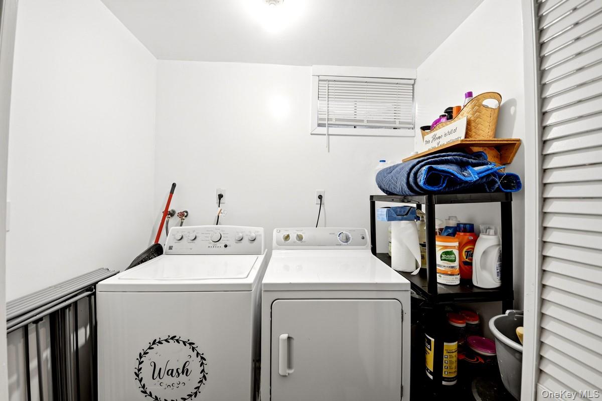 708 Mallard Way Peekskill, NY 10566 - Photo 28 of 29 a utility room with dryer and washer