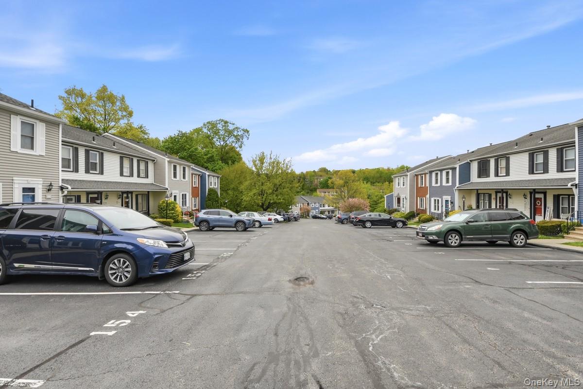708 Mallard Way Peekskill, NY 10566 - Photo 29 of 29 a car parked in front of a building