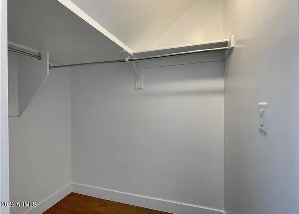 an empty room with sliding door