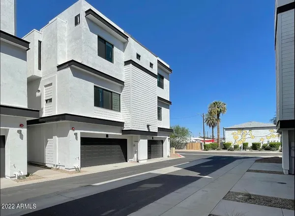 a view of a building with a street