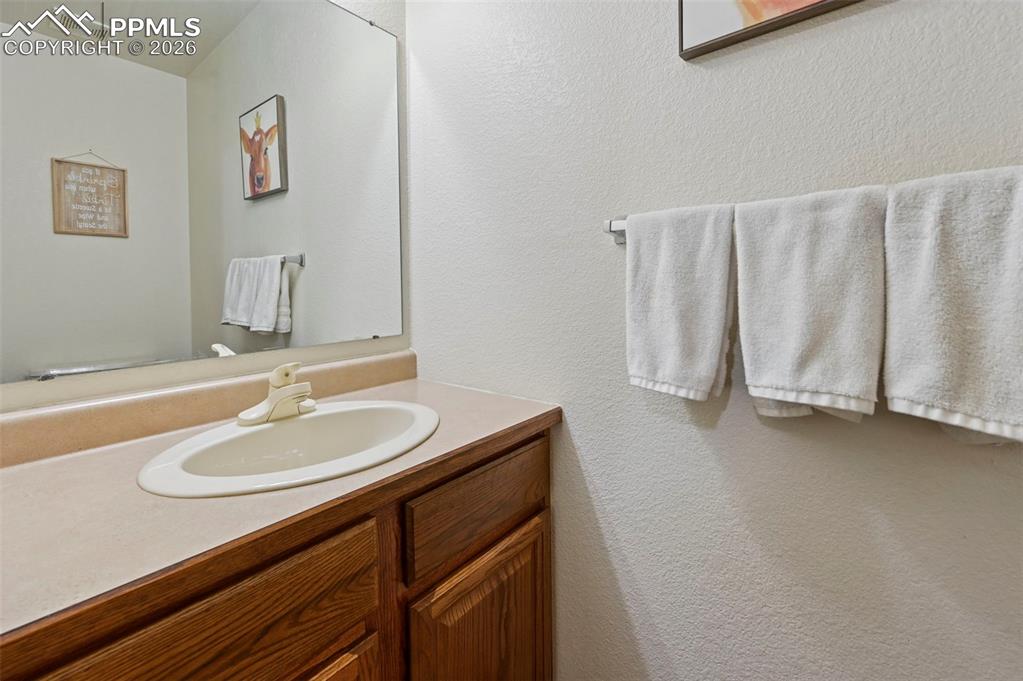 14775 Judge Orr Road Peyton, CO 80831 - Photo 12 of 49 1/2 bath off of Laundry Room