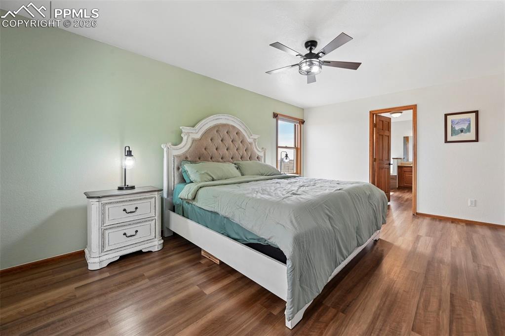 14775 Judge Orr Road Peyton, CO 80831 - Photo 14 of 49 New LVP flooring and ceiling fan