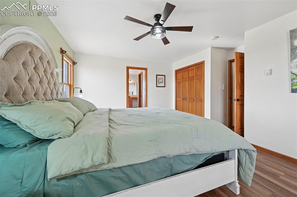 14775 Judge Orr Road Peyton, CO 80831 - Photo 15 of 49 Large Primary Bedroom with Large Closet and Sitting Area