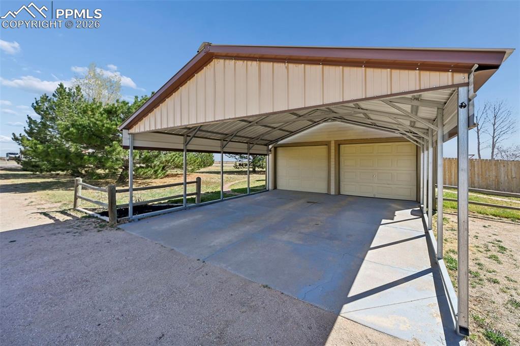 14775 Judge Orr Road Peyton, CO 80831 - Photo 2 of 49 Covered Carport-Heated/Insulated 2 Car Garage