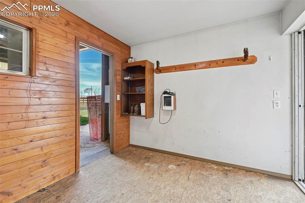 14775 Judge Orr Road Peyton, CO 80831 - Photo 38 of 49 Walk thru Tack Room