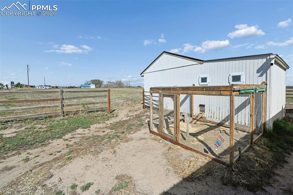 14775 Judge Orr Road Peyton, CO 80831 - Photo 43 of 49 Turn out West Pasture side. Chicken/Goat House