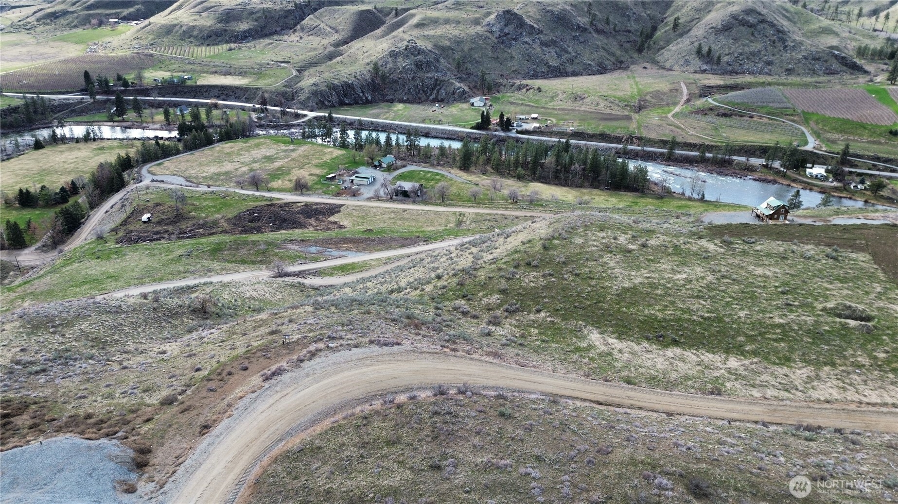0 Flycast Road Pateros, WA 98846 - Photo 5 of 12 a view of a backyard with swimming pool
