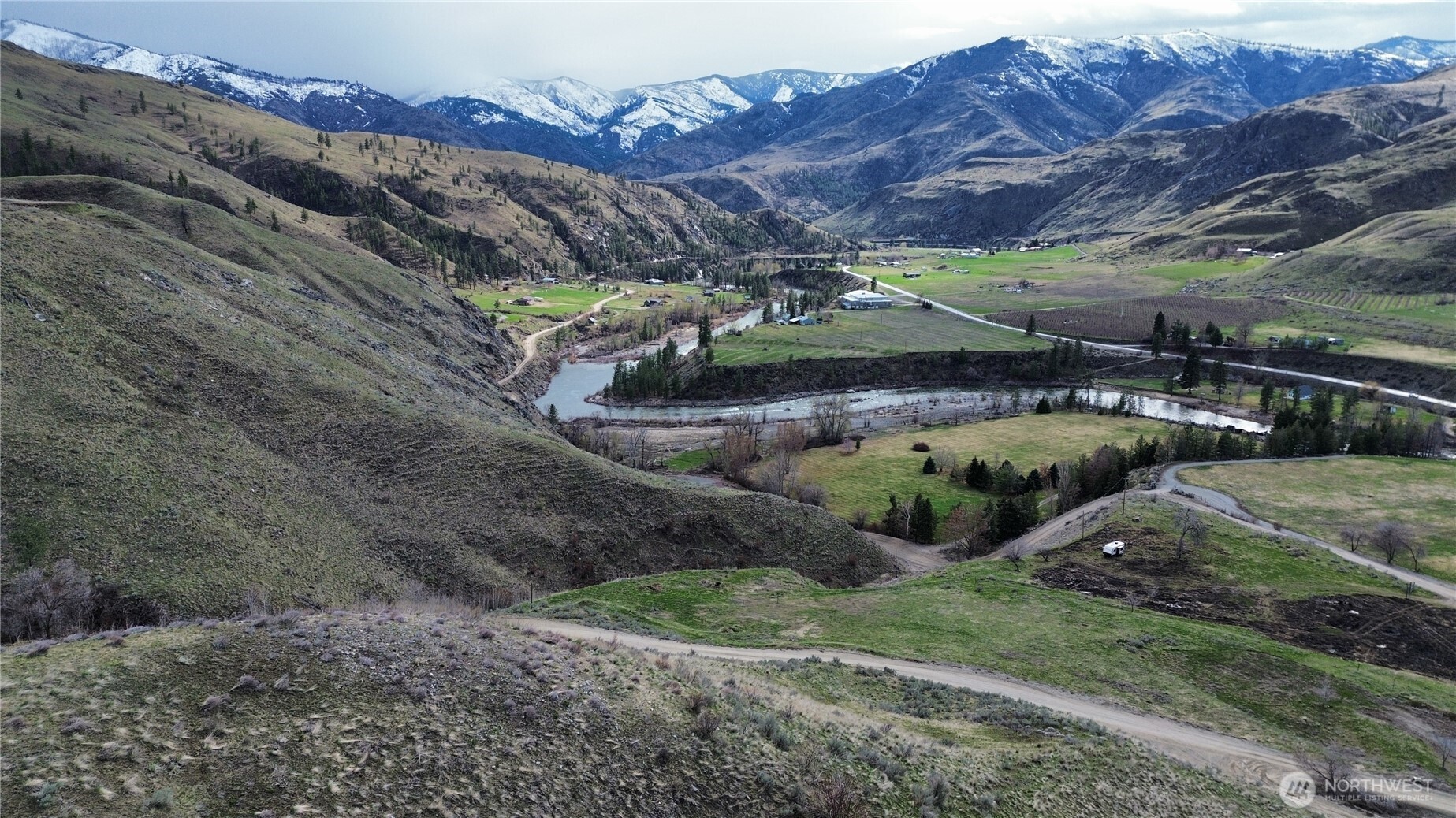 0 Flycast Road Pateros, WA 98846 - Photo 9 of 12 a view of a backyard with wooden fence