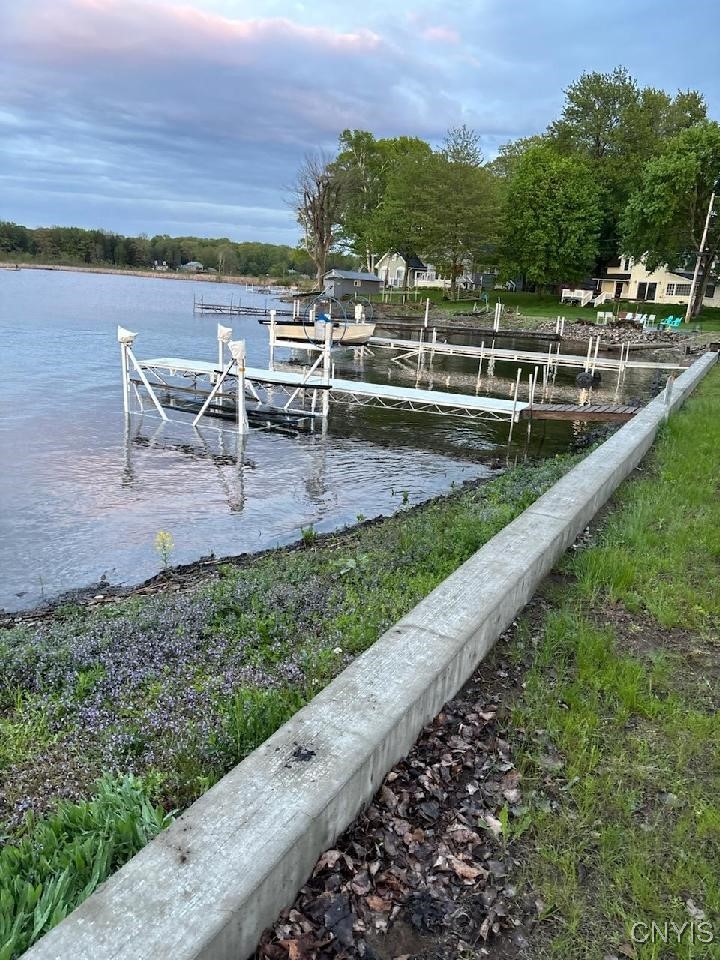 62 Kiblin Shores Road Sandy Creek, NY 13142 - Photo 8 of 24 The dock and hoist are in