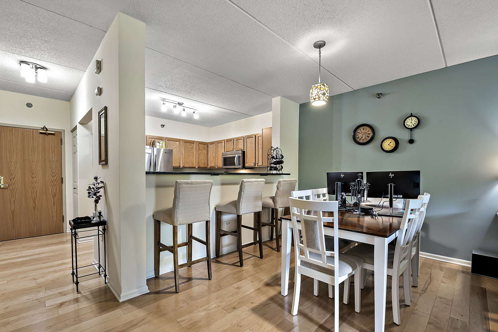 440 West Mahogany Court, Unit 208 Palatine, IL 60067 - Photo 5 of 16 a dining room with furniture and window