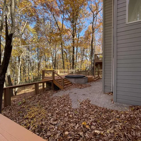 a backyard of a house with lots of green space