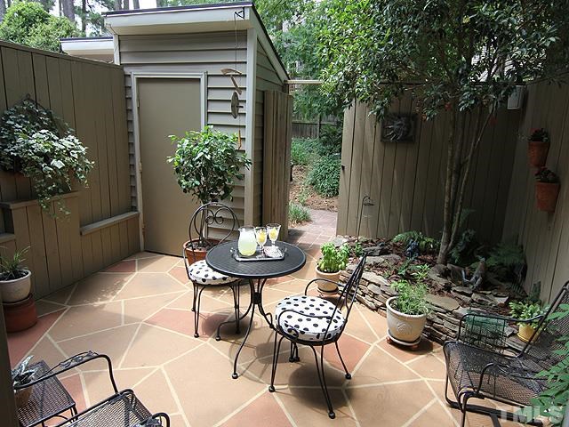 6967 Staghorn Lane Raleigh, NC 27615 - Photo 9 of 11 a outdoor space with a table and chairs