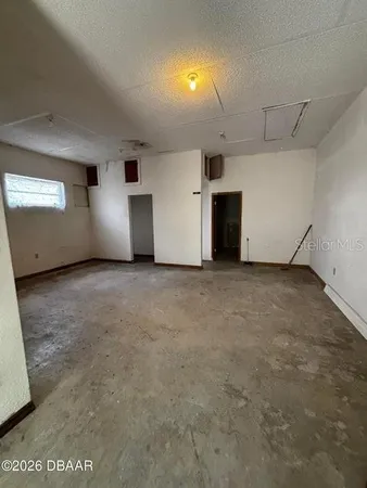 an empty room with windows