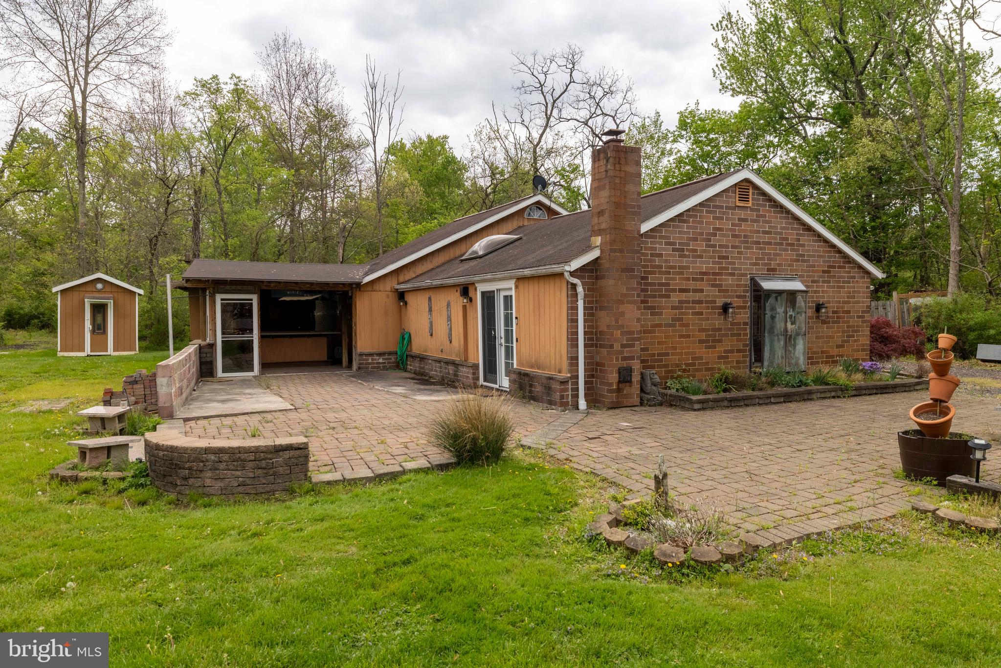 271 Old Croton Road Flemington, NJ 08822 - Photo 9 of 34 a front view of a house with a yard and garage