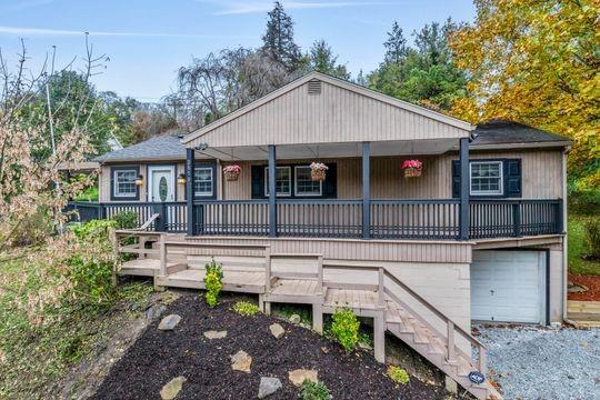 2050 Township Road Monroeville, PA 15146 - Photo 1 of 25 a view of a house with a yard and furniture