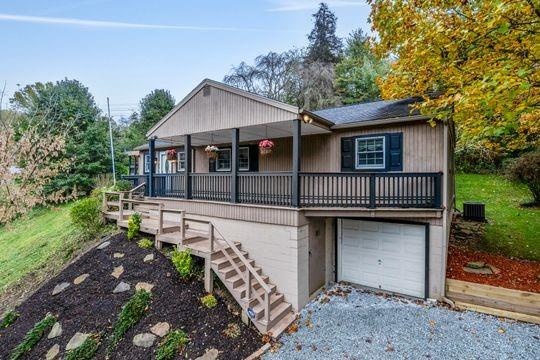 2050 Township Road Monroeville, PA 15146 - Photo 2 of 25 a front view of a house with garden