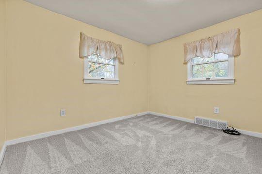 2050 Township Road Monroeville, PA 15146 - Photo 16 of 25 an empty room with a painting on the wall