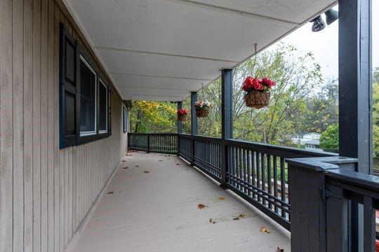 2050 Township Road Monroeville, PA 15146 - Photo 3 of 25 a view of a porch and flowers