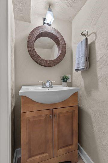 2050 Township Road Monroeville, PA 15146 - Photo 23 of 25 a bathroom with a sink and a mirror