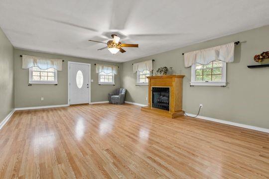 2050 Township Road Monroeville, PA 15146 - Photo 6 of 25 an empty room with windows and fireplace