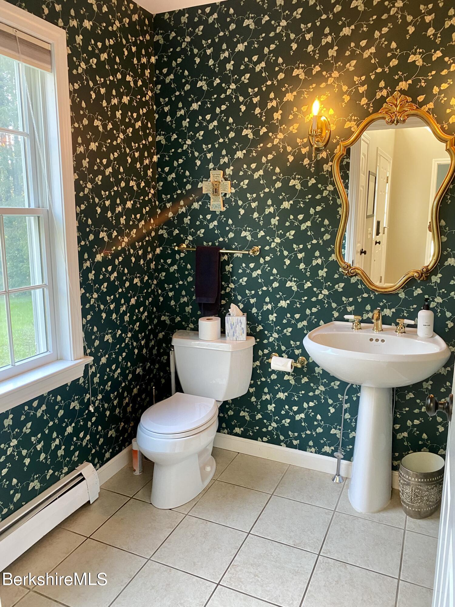 199 Old Post Road Richmond, MA 01201 - Photo 11 of 40 a bathroom with a sink toilet and mirror