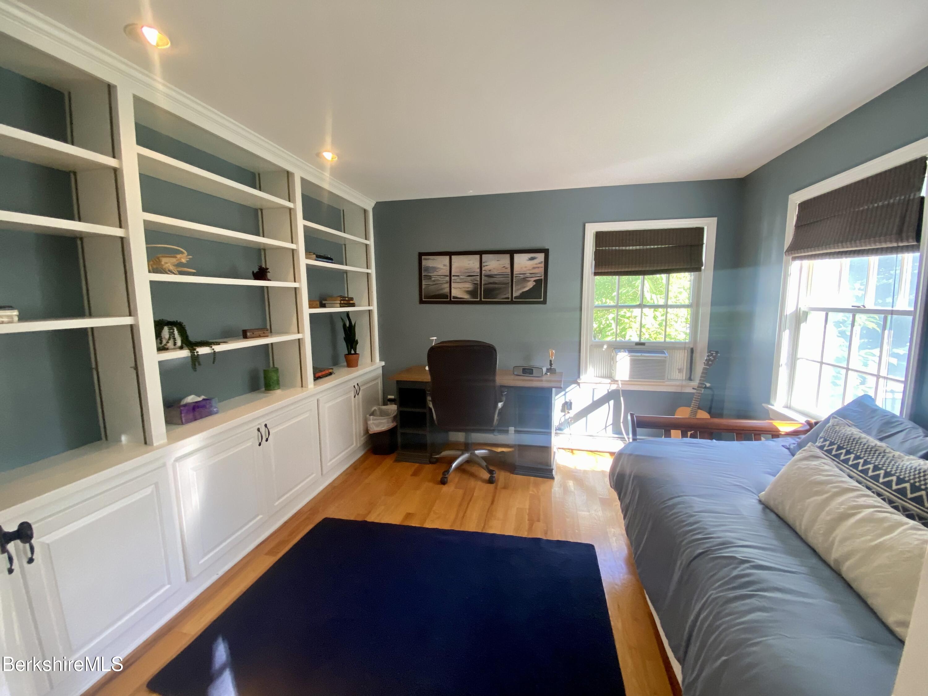 199 Old Post Road Richmond, MA 01201 - Photo 16 of 40 a living room with furniture and a flat screen tv