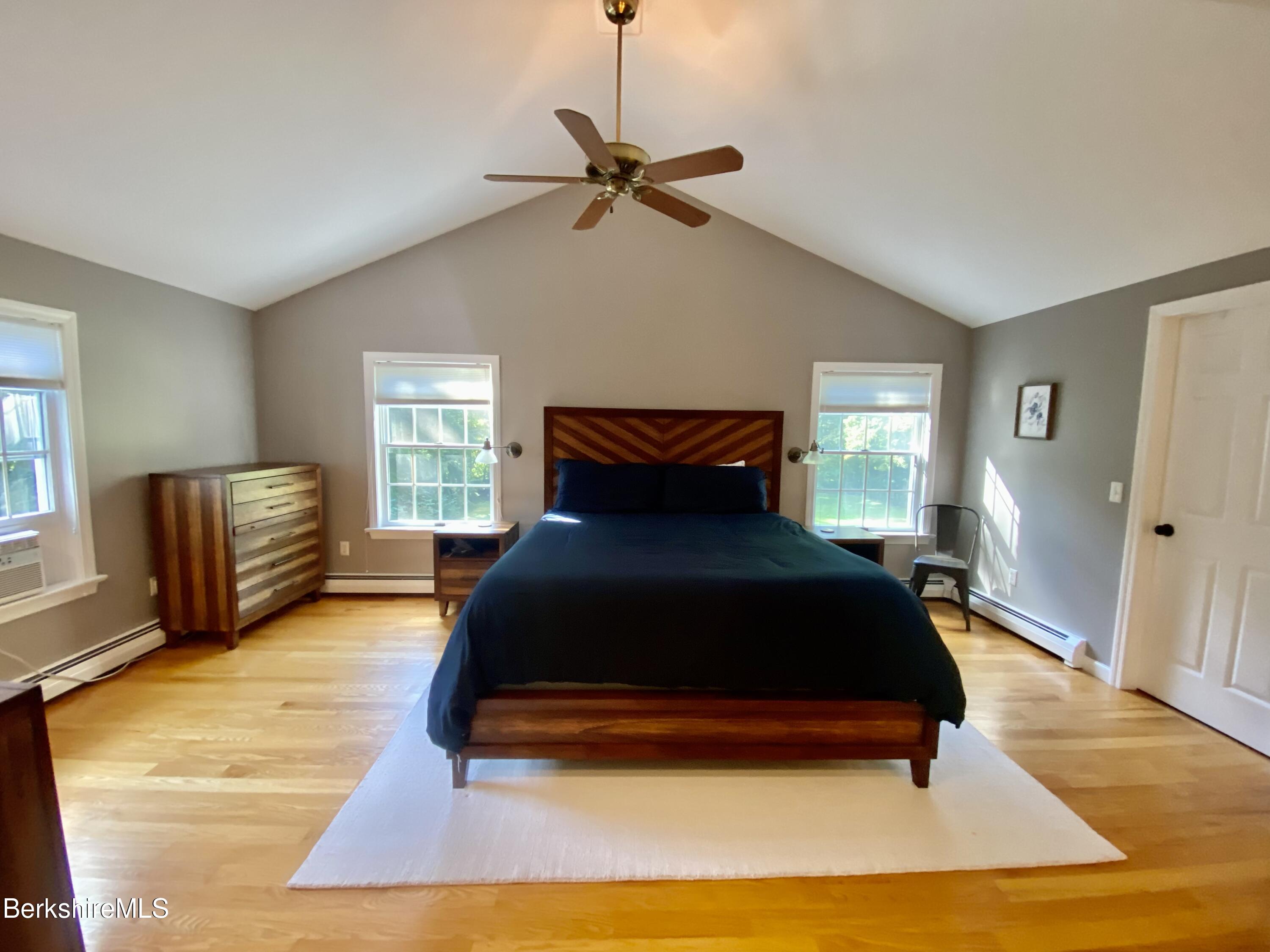 199 Old Post Road Richmond, MA 01201 - Photo 18 of 40 a bedroom with a bed and window