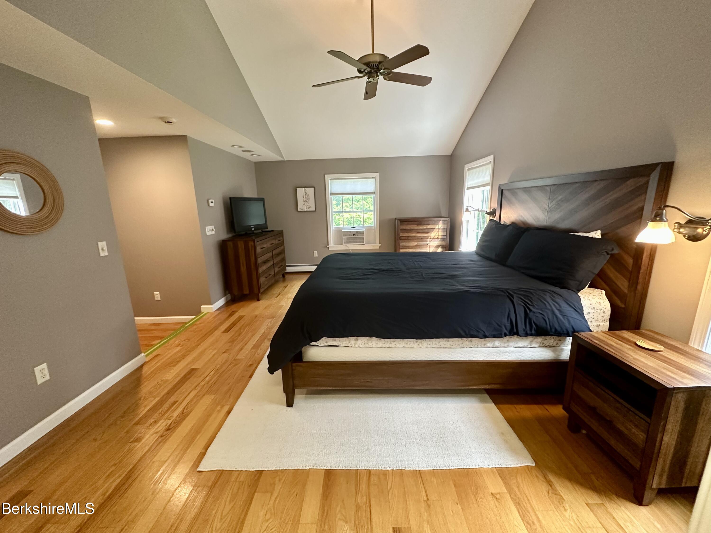 199 Old Post Road Richmond, MA 01201 - Photo 21 of 40 a bedroom with a bed and window