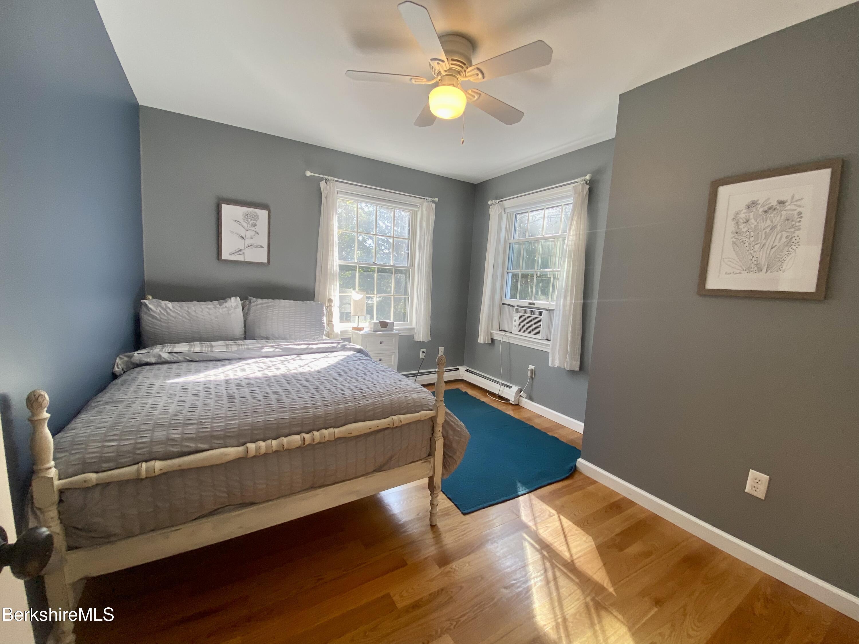 199 Old Post Road Richmond, MA 01201 - Photo 24 of 40 a bedroom with a bed and a window