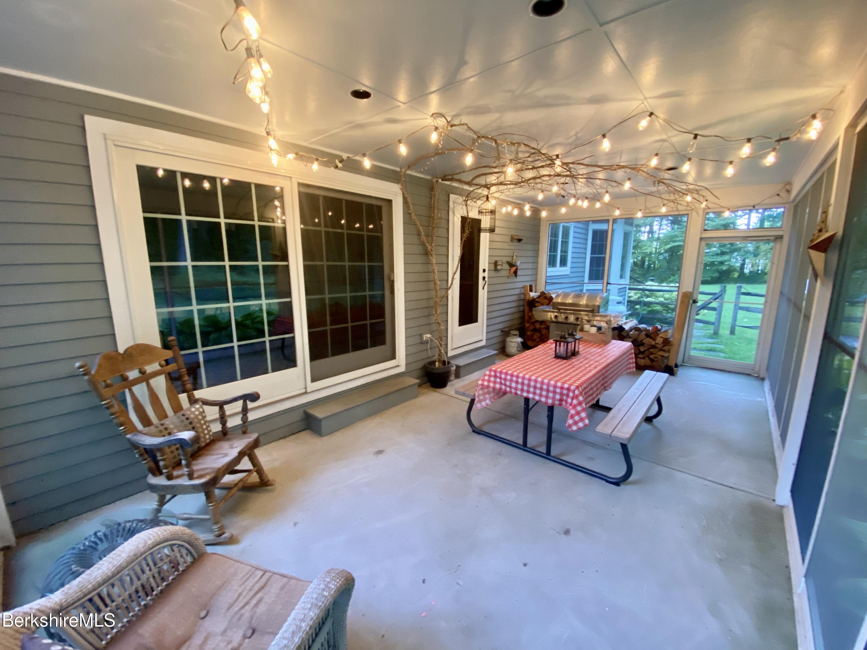 199 Old Post Road Richmond, MA 01201 - Photo 37 of 40 a bedroom with furniture and a large window