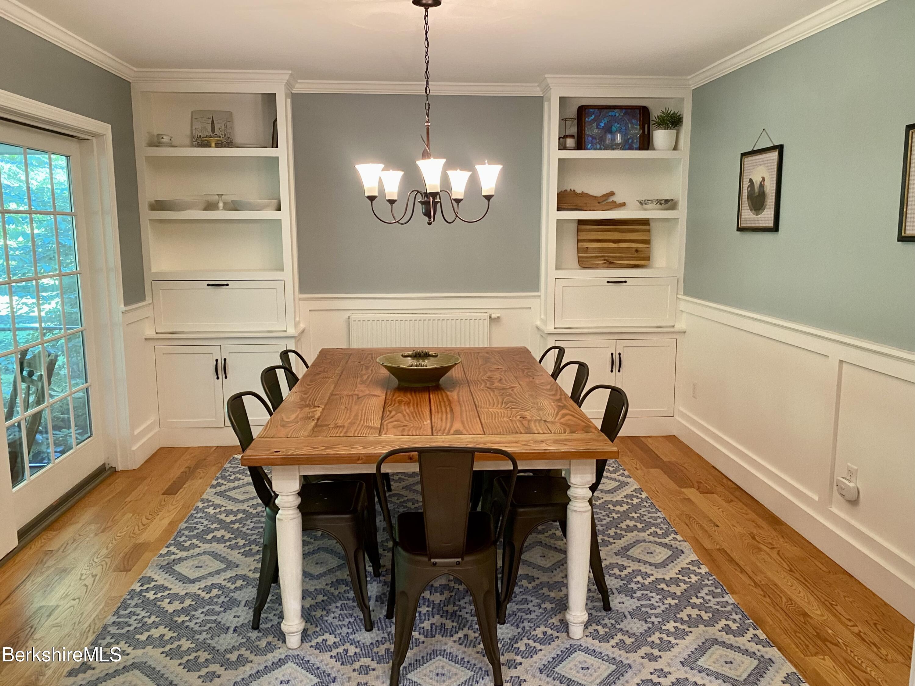199 Old Post Road Richmond, MA 01201 - Photo 10 of 40 a view of a dining room with furniture window and wooden floor