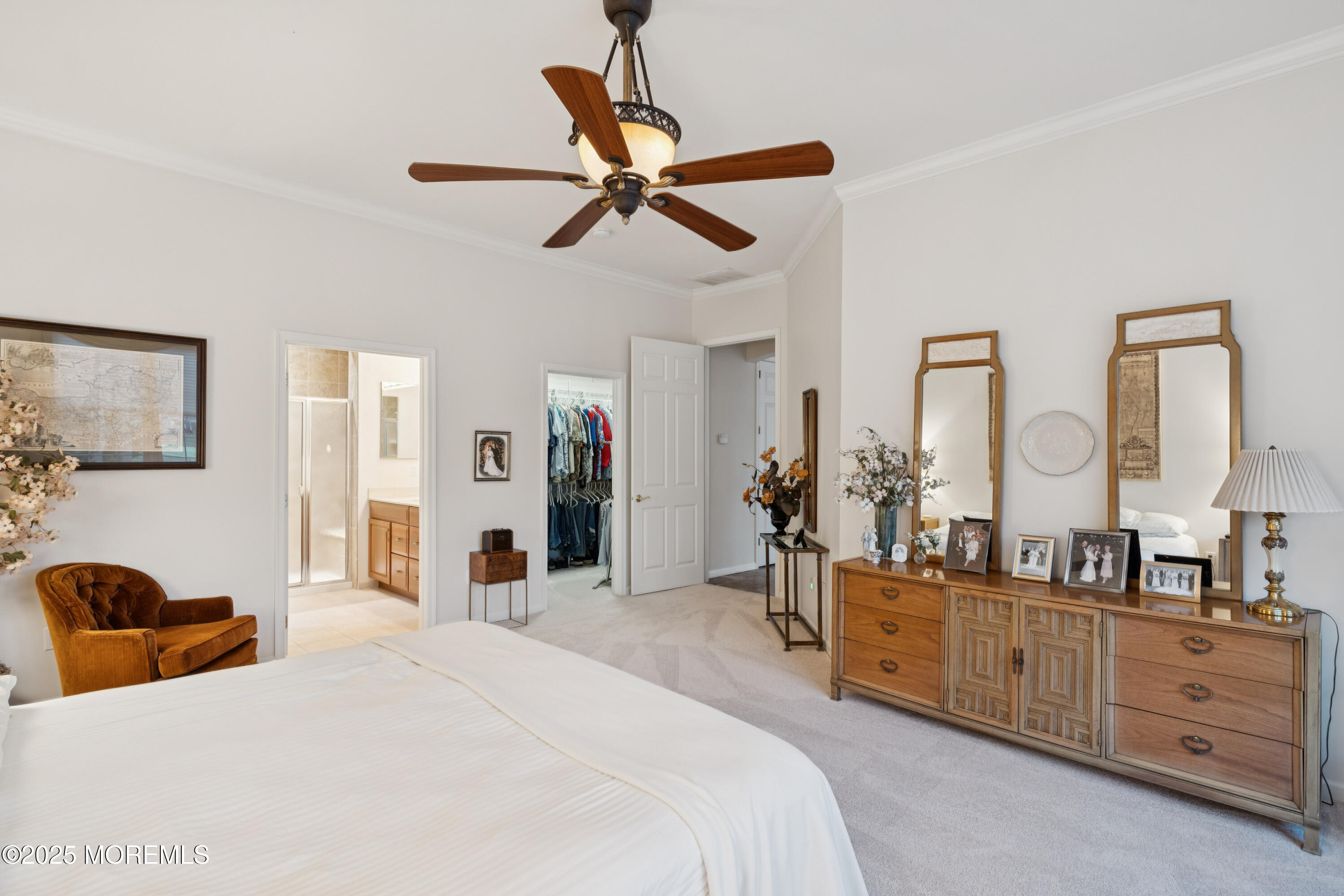 66 Crooked Stick Road Jackson, NJ 08527 - Photo 17 of 25 a bedroom with a bed and ceiling fan