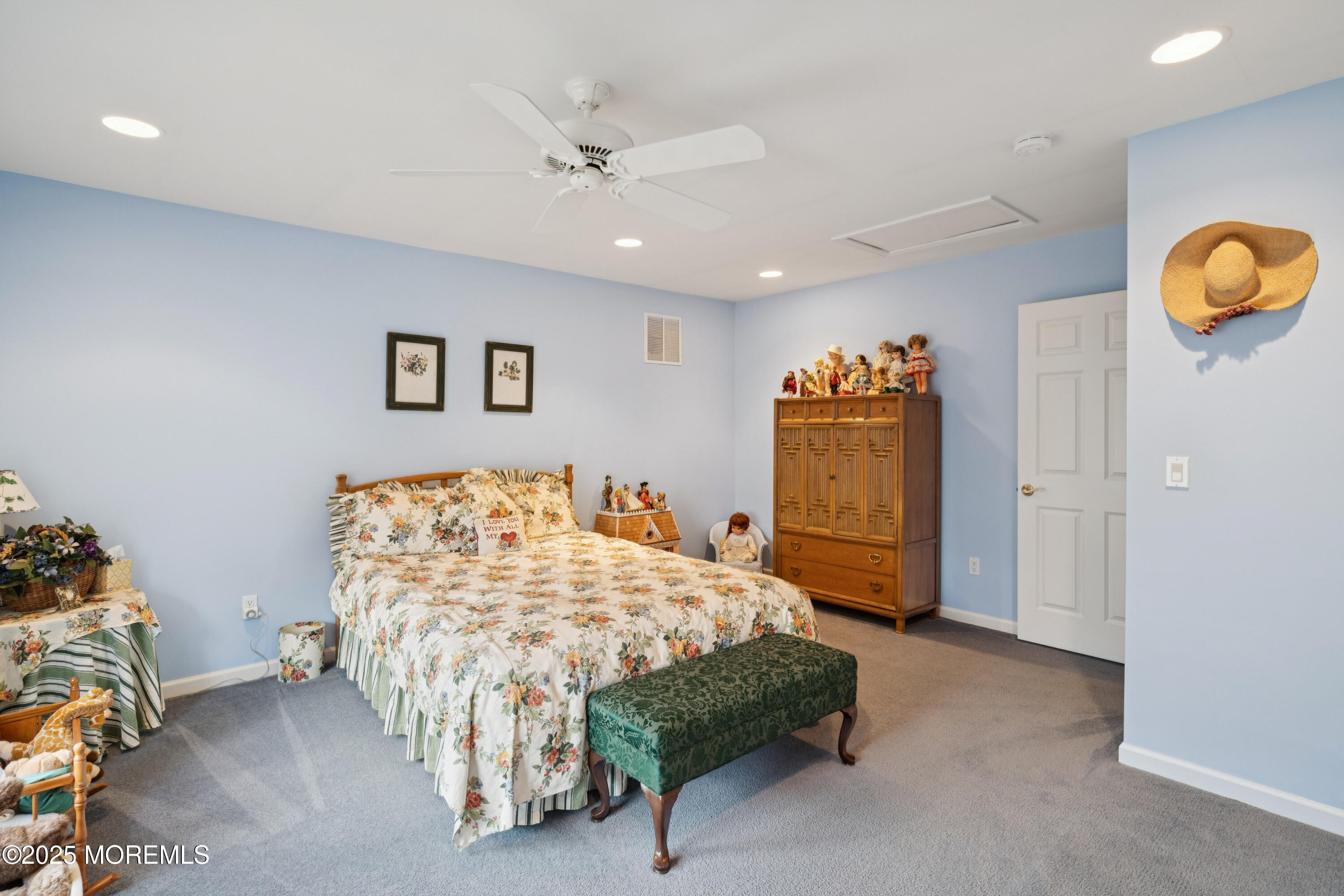 66 Crooked Stick Road Jackson, NJ 08527 - Photo 21 of 25 a bedroom with a bed and painting on the wall